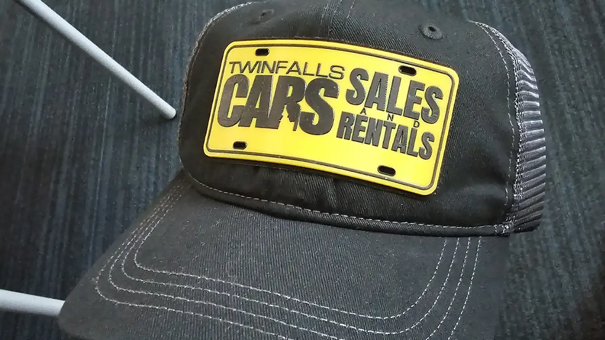 Liquid 3D patch hat and license plate insert for Twin Falls Cars Sales and Rentals